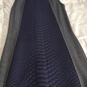 Sleeveless snake print sheath dress